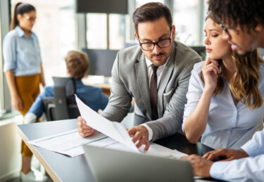 group-of-multiethnic-business-people-working-at-busy-modern-office