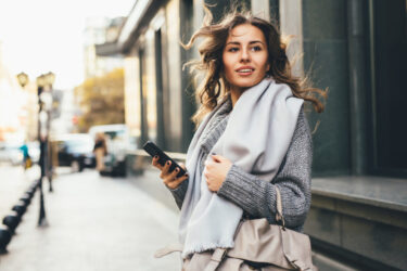 woman-texting-outdoors